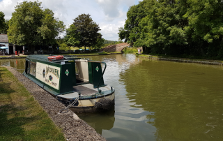 Moorhen, one of the union wharf narrowboats day boats, moored by foxton locks